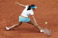 La austriaca Tamira Paszek cayó ante la belga Justine Henin en el certamen de París